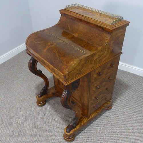 504 - A Victorian burr walnut piano top Davenport Desk, the rectangular top with pierced brass three-quart... 