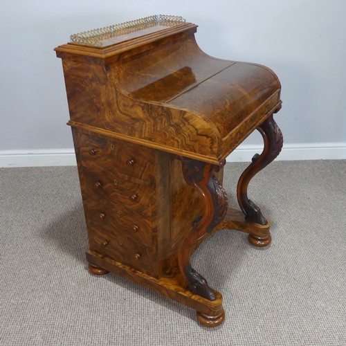 504 - A Victorian burr walnut piano top Davenport Desk, the rectangular top with pierced brass three-quart... 