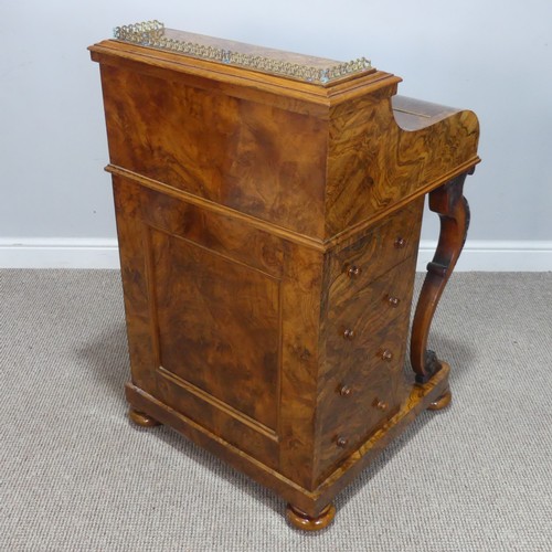 504 - A Victorian burr walnut piano top Davenport Desk, the rectangular top with pierced brass three-quart... 