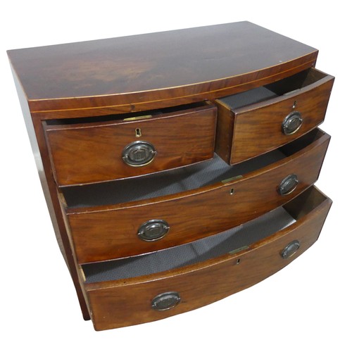 508 - An Antique mahogany bowfront Chest of drawers, with decorative bronze metal oval handles and locks s... 