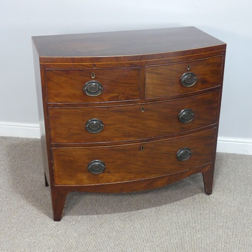 508 - An Antique mahogany bowfront Chest of drawers, with decorative bronze metal oval handles and locks s... 