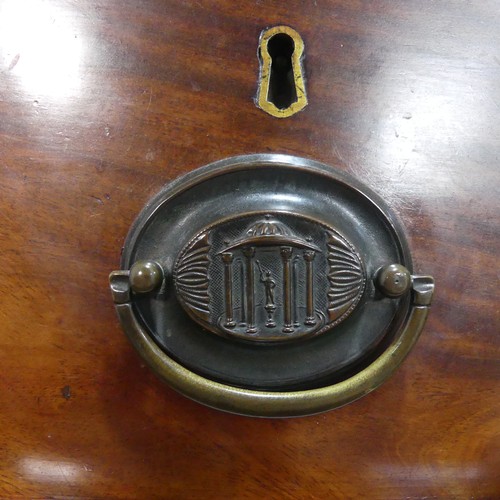 508 - An Antique mahogany bowfront Chest of drawers, with decorative bronze metal oval handles and locks s... 