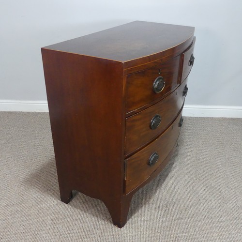 508 - An Antique mahogany bowfront Chest of drawers, with decorative bronze metal oval handles and locks s... 