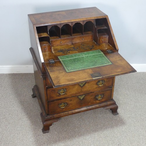 509 - A small Georgian flame mahogany Bureau, sloped fall front enclosing gilt tooled writing skiver and f... 