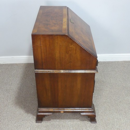 509 - A small Georgian flame mahogany Bureau, sloped fall front enclosing gilt tooled writing skiver and f... 