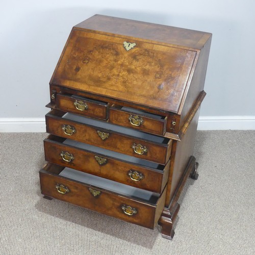 509 - A small Georgian flame mahogany Bureau, sloped fall front enclosing gilt tooled writing skiver and f... 