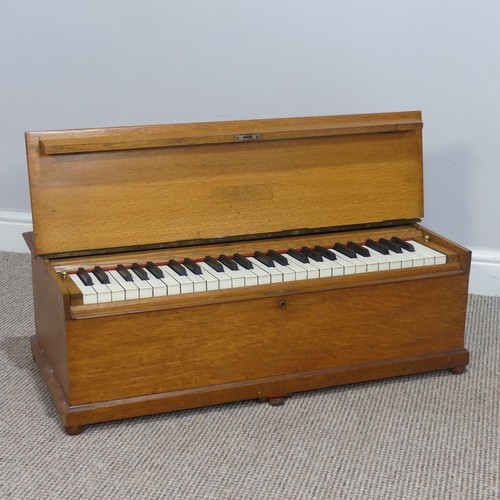 510 - An early 20th century oak cased 'Dulcitone' portable Piano, made by 'Thomas Machell, Glasgow', stamp... 