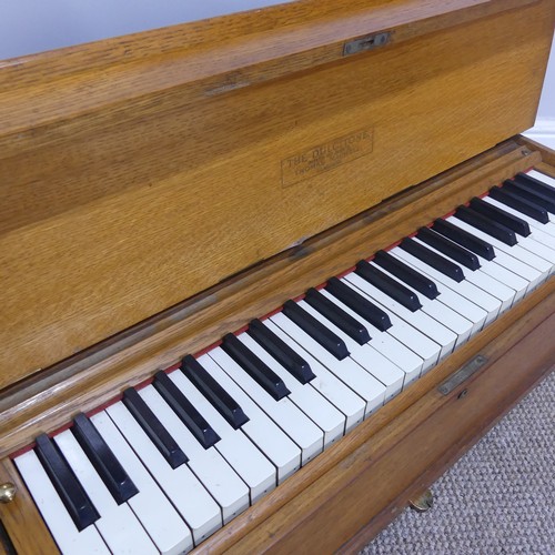 510 - An early 20th century oak cased 'Dulcitone' portable Piano, made by 'Thomas Machell, Glasgow', stamp... 