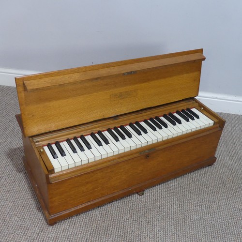 510 - An early 20th century oak cased 'Dulcitone' portable Piano, made by 'Thomas Machell, Glasgow', stamp... 