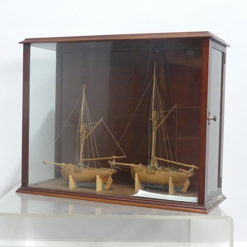 511 - A pair of 19th century model Ships in display case, by Martin Brydon, a sailor who was held prisoner... 