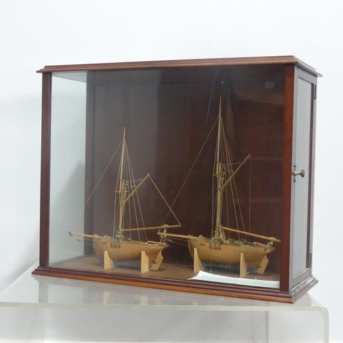 511 - A pair of 19th century model Ships in display case, by Martin Brydon, a sailor who was held prisoner... 