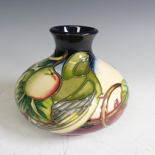 83 - A Moorcroft 'Finches and Apples' pattern squat baluster Vase, on cream and basalt ground, dated 2003... 