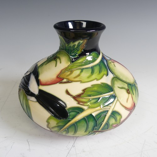 83 - A Moorcroft 'Finches and Apples' pattern squat baluster Vase, on cream and basalt ground, dated 2003... 