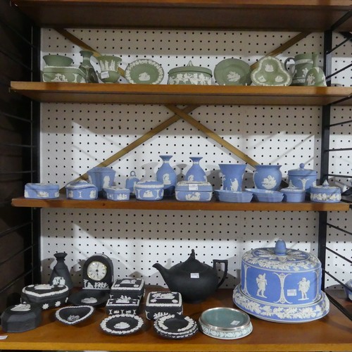 42 - A large quantity of Wedgwood and other Jasperwares, comprising pieces in light blue, dark blue, sage... 