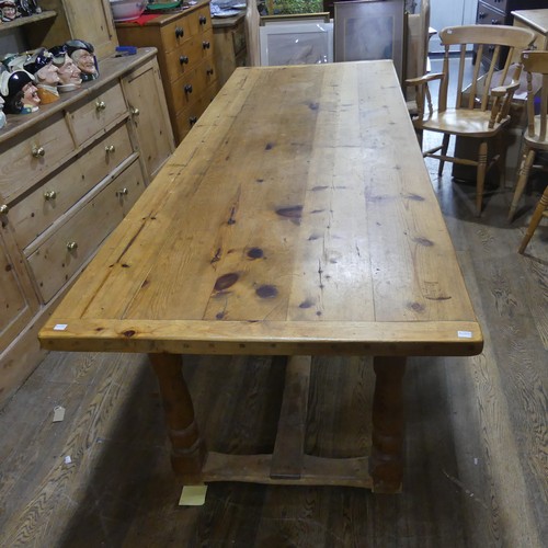 477 - An Antique pine Kitchen Refectory Dining Table, five plank top with small repair, raised on four tur... 