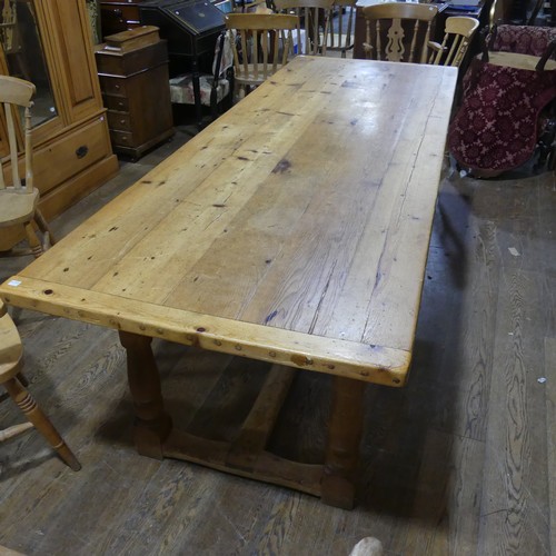 477 - An Antique pine Kitchen Refectory Dining Table, five plank top with small repair, raised on four tur... 