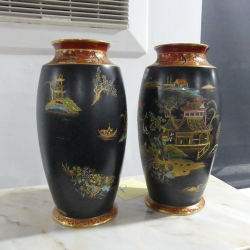 15 - A pair of late 19thC Carltonware Satsuma Vases, with black ground and enameled depictions of pagodas... 