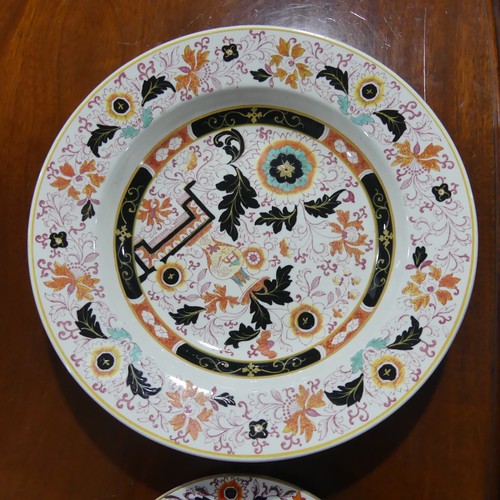 31 - A Victorian Ironstone Dinner Service, decorated in somewhat imari pattern, some marked for Ashworth ... 