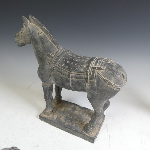 88 - A Tang-style pottery Horse, modelled with tack,  raised on plinth base, H 27cm, together with six Te... 