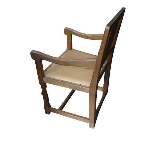 465 - Robert 'Mouseman' Thompson of Kilburn: An oak carver Chair, the lattice backrest, over a cushioned s... 