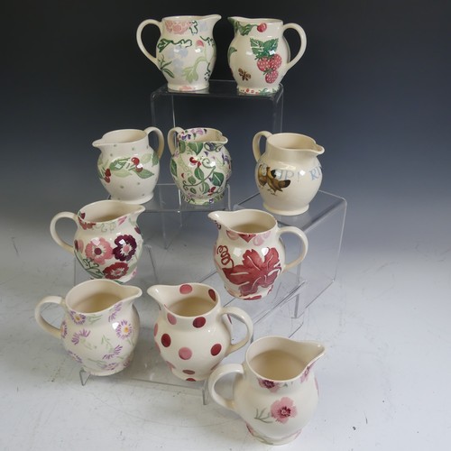 74 - A quantity of Emma Bridgewater pottery Jugs, of varying patterns comprising Rise and Shine, Strawber... 