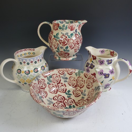 76 - An Emma Bridgewater 'Polka Folk' pattern Jug, sponged in colourful patterns, factory marks to base, ... 