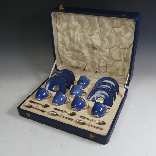 1 - A boxed Royal Worcester six place Coffee Set, comprising six Coffee Cans, one handle missing, and Sa... 