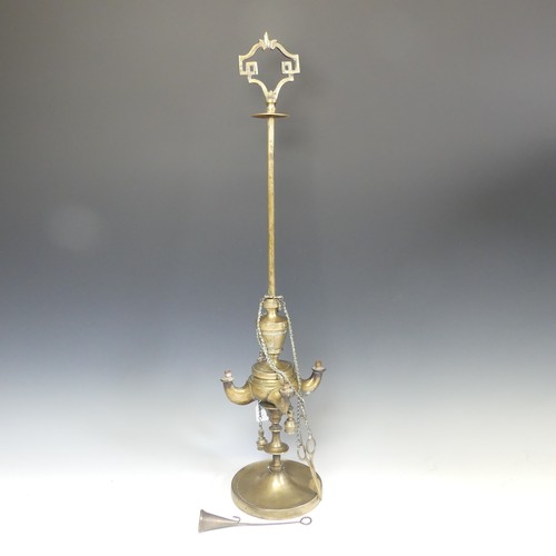 415 - A Lucerna Venetian brass Reading Lamp, with some attempt to convert to electricity, H 67cm.... 