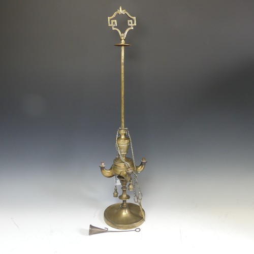 415 - A Lucerna Venetian brass Reading Lamp, with some attempt to convert to electricity, H 67cm.... 