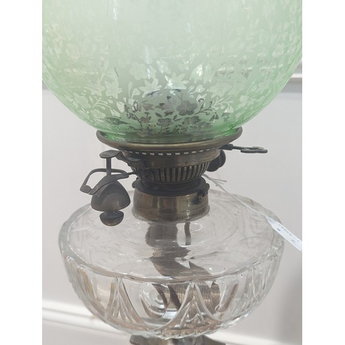 414 - A large late 19thC Oil Lamp, with cut glass font on brass Corinthian column base, with green acid et... 