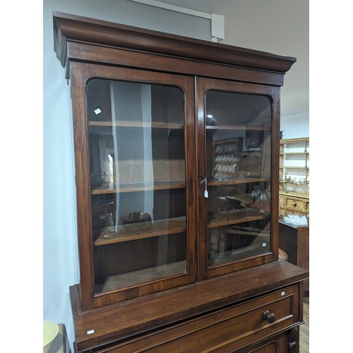 446 - A Victorian mahogany secretaire Bookcase, moulded cornice above two glazed bookcase doors enclosing ... 