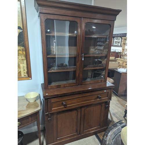 446 - A Victorian mahogany secretaire Bookcase, moulded cornice above two glazed bookcase doors enclosing ... 