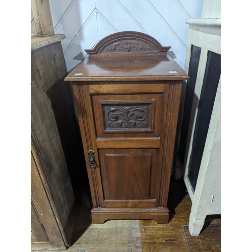 453 - An Antique mahogany pot Cupboard, with carved panel, W 39.5 cm x H 80 cm x D 34 cm.