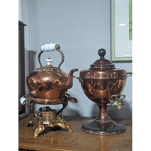 497 - A mid 19th century copper and brass spirit Kettle on tilting stand, underside of lid stamped 'warran... 