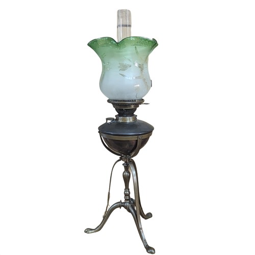 503 - An late 19thC Oil Lamp, with acid etched glass shade, raised on copper and brass tripod stand, marke... 