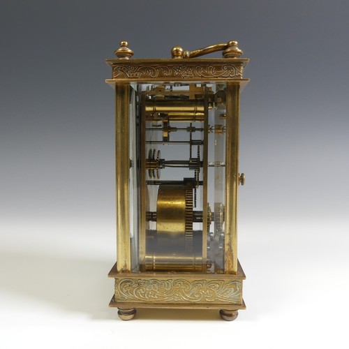 237 - A 20th Century cased French 8 day gilt brass Carriage Clock, with engraved foliate edges, H 13 cm.... 