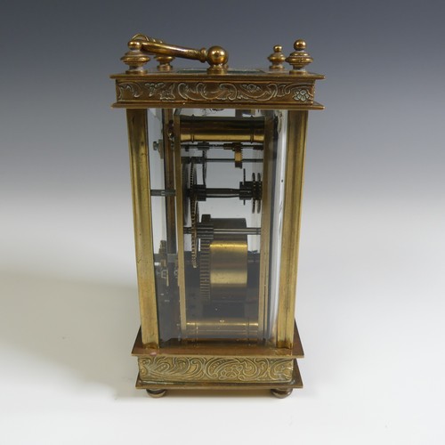 237 - A 20th Century cased French 8 day gilt brass Carriage Clock, with engraved foliate edges, H 13 cm.... 