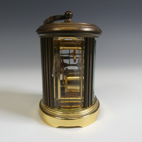 238 - A miniature Matthew Norman oval five glass carriage Clock, H 8 cm.