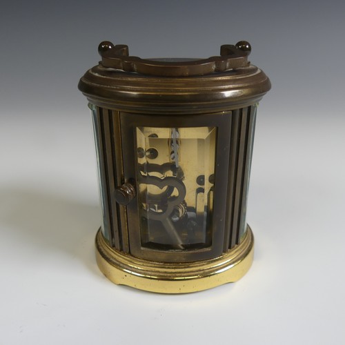 238 - A miniature Matthew Norman oval five glass carriage Clock, H 8 cm.