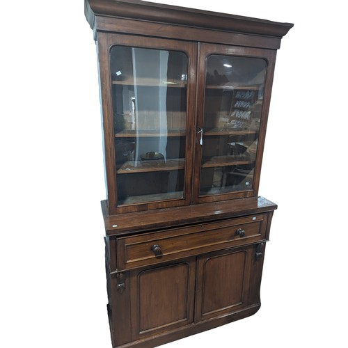 446 - A Victorian mahogany secretaire Bookcase, moulded cornice above two glazed bookcase doors enclosing ... 