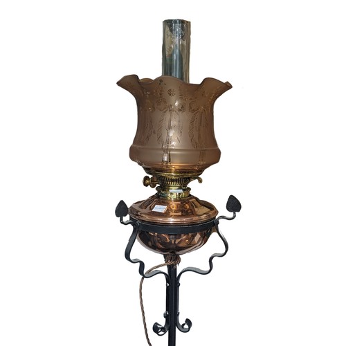 494 - A Victorian wrought iron and copper oil-burner standard Lamp, with Joseph Hinks duplex no.2 burner, ... 