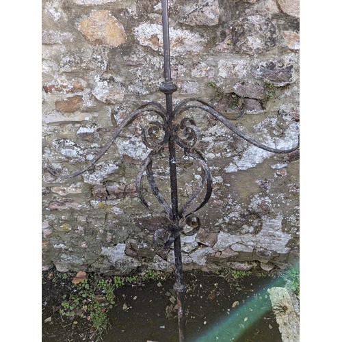 533 - An Antique painted wrought iron Weather Vane, with painted metal running Fox surmount above four scr... 