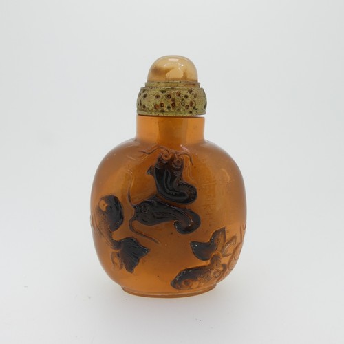 98 - A Chinese Peking glass Snuff Bottle, of white ground with overlayed pink depictions of a Tiger, Bat ... 