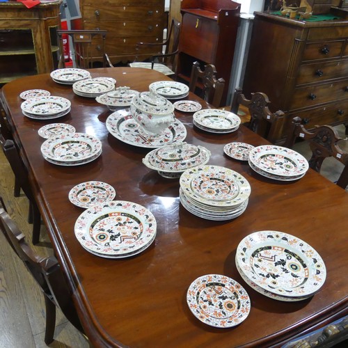 82 - A Victorian Ironstone Dinner Service, decorated in somewhat imari pattern, some marked for Ashworth ... 