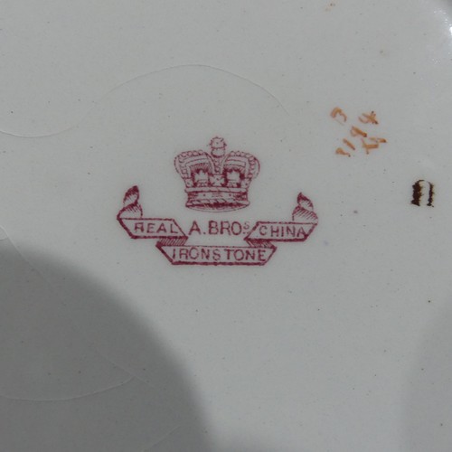 82 - A Victorian Ironstone Dinner Service, decorated in somewhat imari pattern, some marked for Ashworth ... 