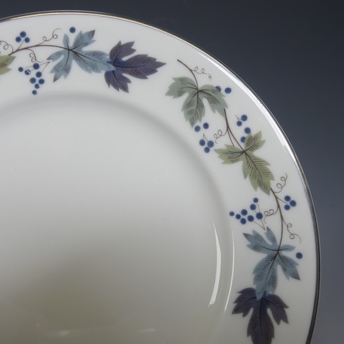 102 - A Royal Doulton 'Burgundy' pattern part Dinner Service, comprising Dinner Plates, Tureens, etc. (a l... 