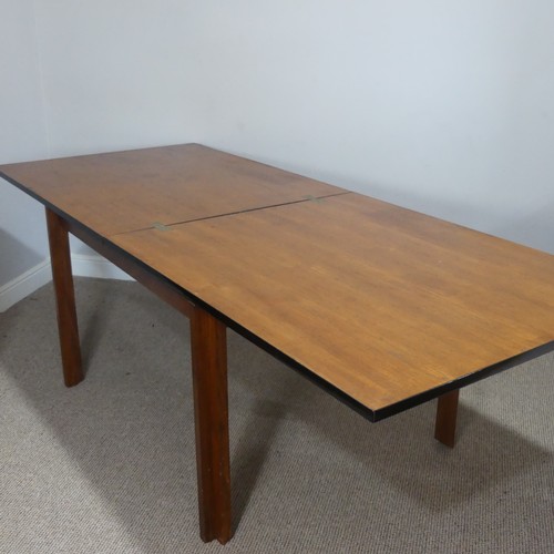 323 - A mid-20thC teak extending folding Dining Table, a prototype designed by Martin Grierson, provenance... 