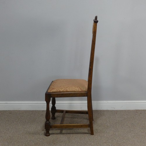 318 - A Set of Six Arts and Crafts oak Dining Chairs, the top rails with upholstered headrests, stick back... 