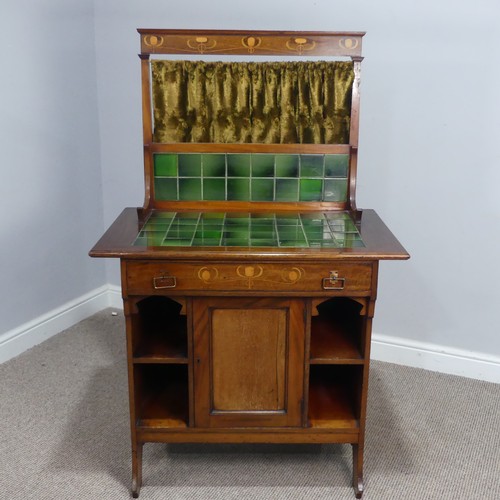 344 - An unusual small Arts and Crafts mahogany Dresser / Washstand, with green tiles and stylised floral ... 