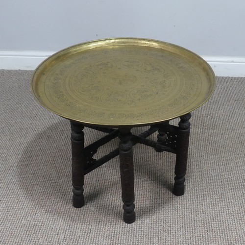 333 - A Persian circular brass folding 'Benares' tray Table, W 57 cm x H 45 cm x D 57 cm, together with a ... 